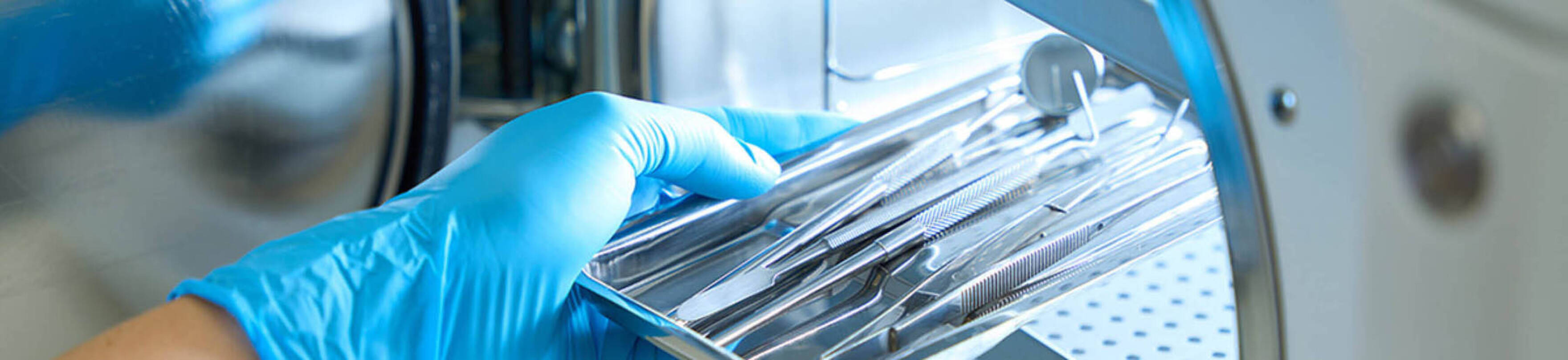 Image of dental instruments being cleaned and sterilized