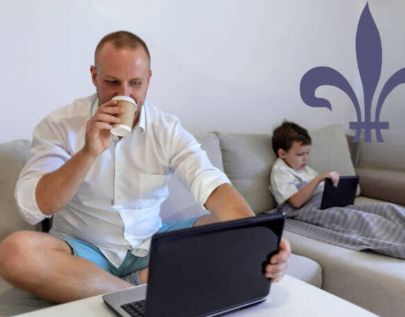 Dad doing online work with son