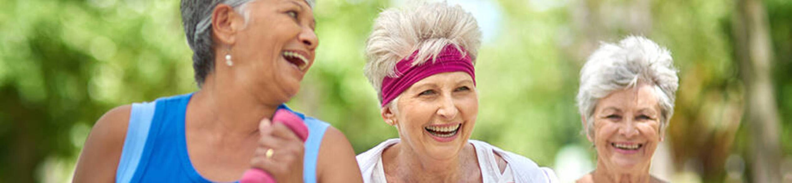 Three women exercising longevity wellness