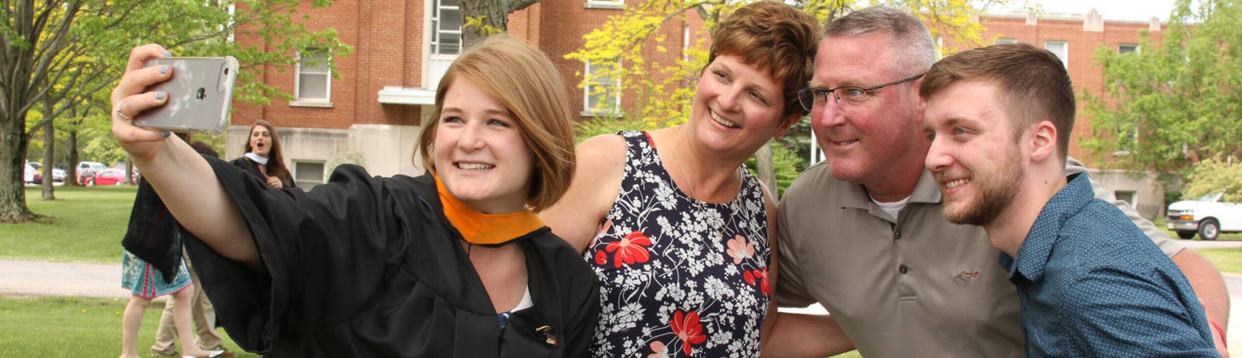 Ursuline college students graduation day with parents2